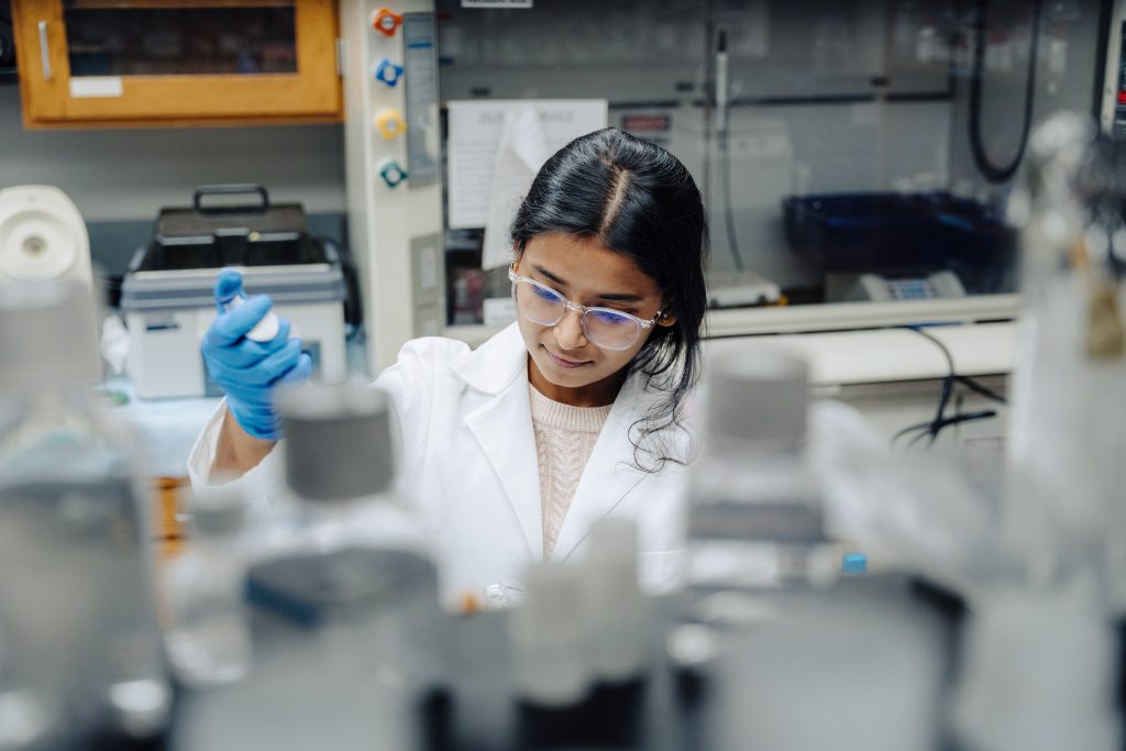 Photo of a researcher in a cancer lab.