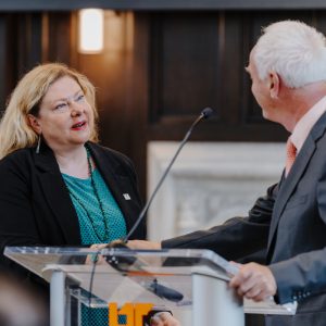 Photo of Laurie Powell and Chancellor Peter Buckley