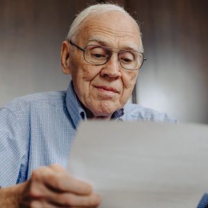 Dr. Wilson reading one of his student's letters
