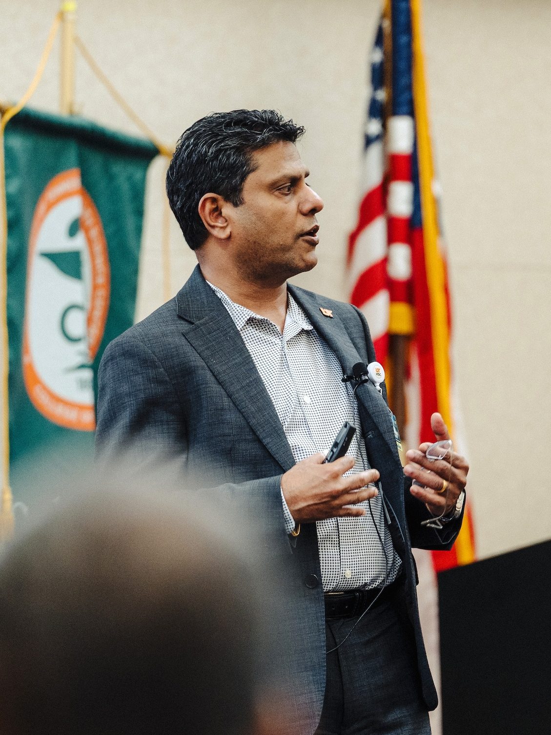 Raaj Kurapati speaking at the town hall