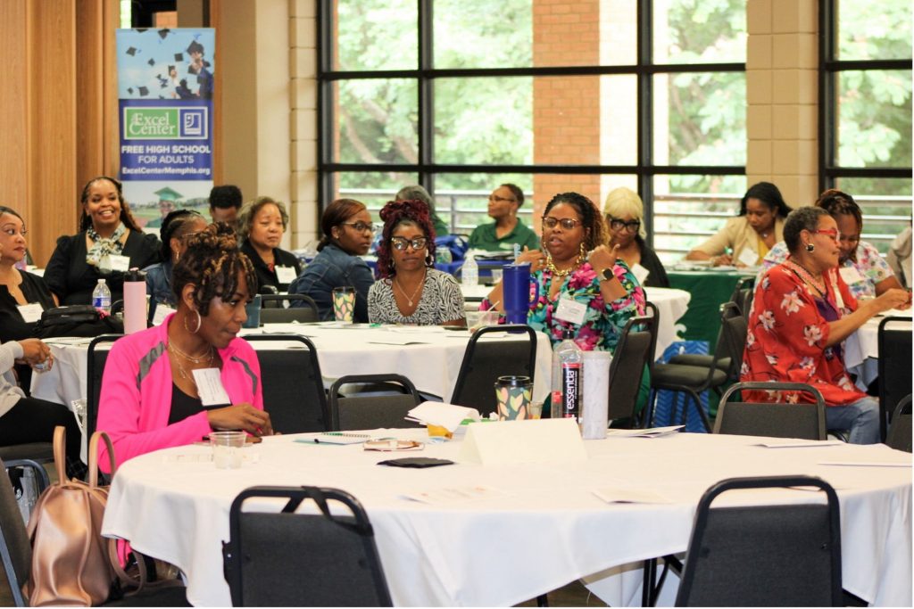 Attendees of the Caregiving Conference sitting at tables