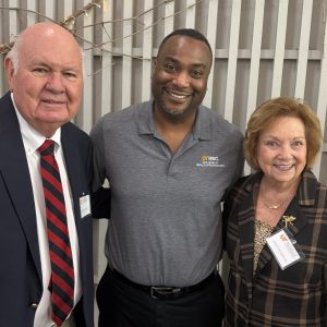 Dr. Ray Patterson, Dr. Carlos Clardy and Linda Patterson pose for a photo together at an event.